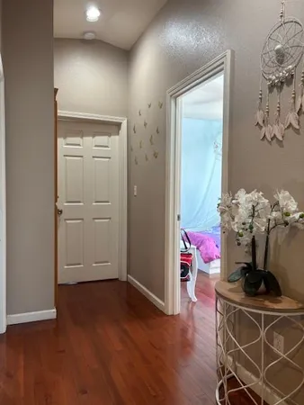 a dining room with wooden floor