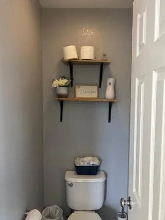 a bathroom with a toilet