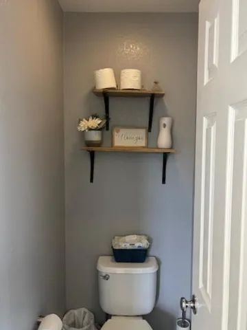 a bathroom with a toilet