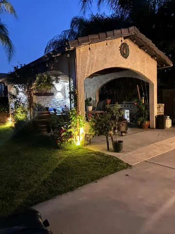 a view of house with garden