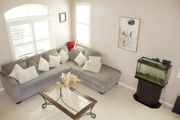 a living room with furniture and a window