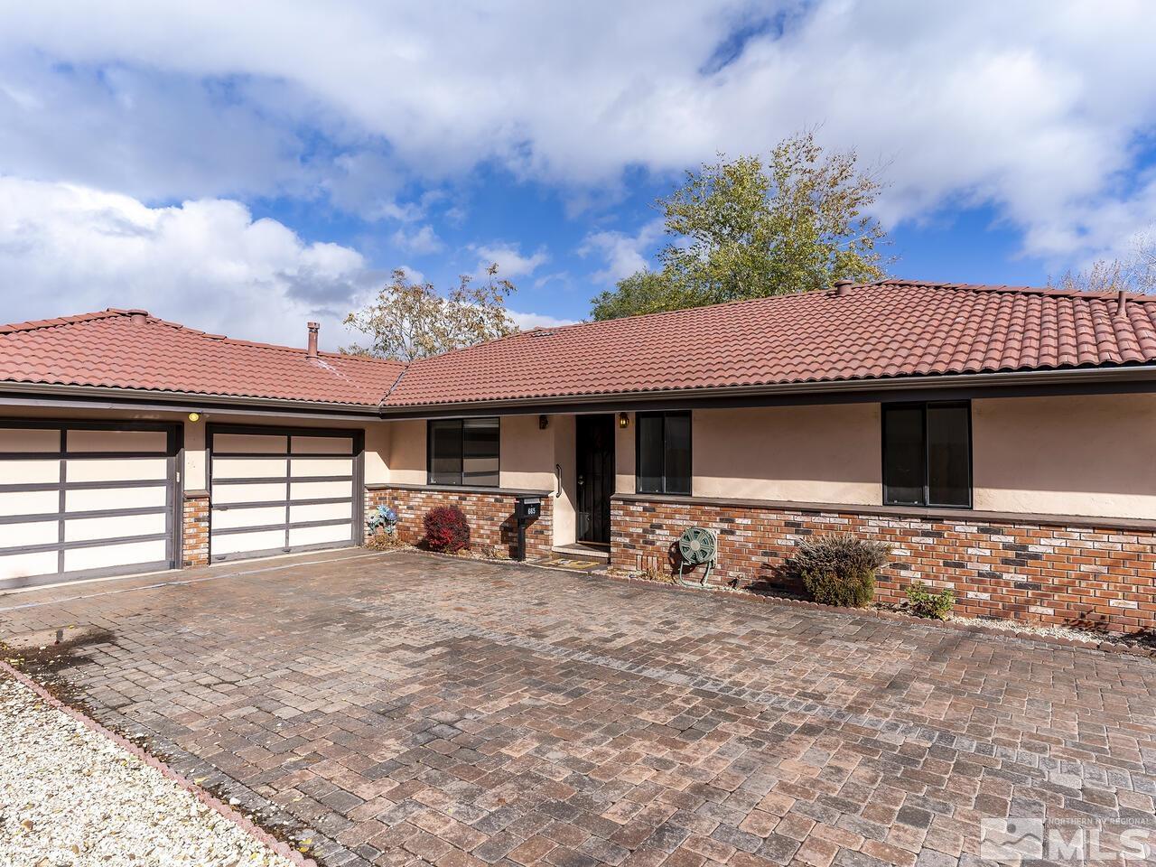 665 College Drive Reno, NV 89503 - Photo 1 of 25 a view of a house with a patio