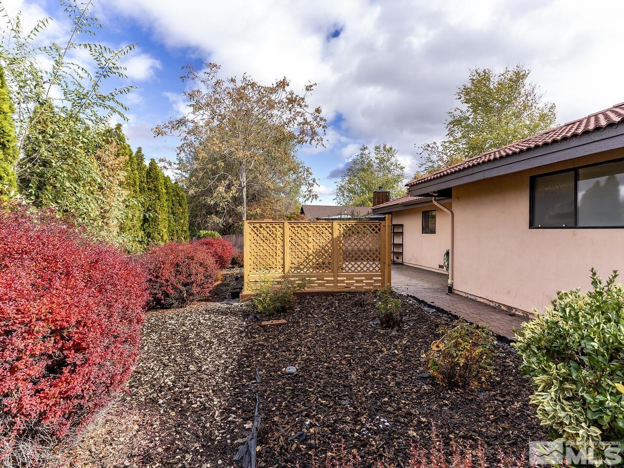 665 College Drive Reno, NV 89503 - Photo 23 of 25 a backyard of a house with lots of green space