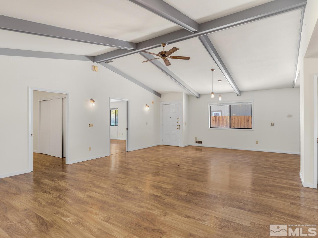 665 College Drive Reno, NV 89503 - Photo 6 of 25 a view of empty room with wooden floor