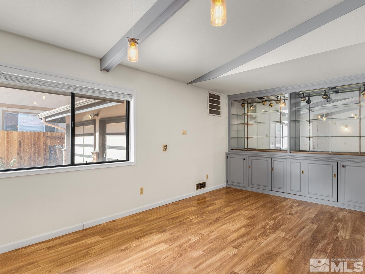 665 College Drive Reno, NV 89503 - Photo 8 of 25 a view of a room with window and cabinet