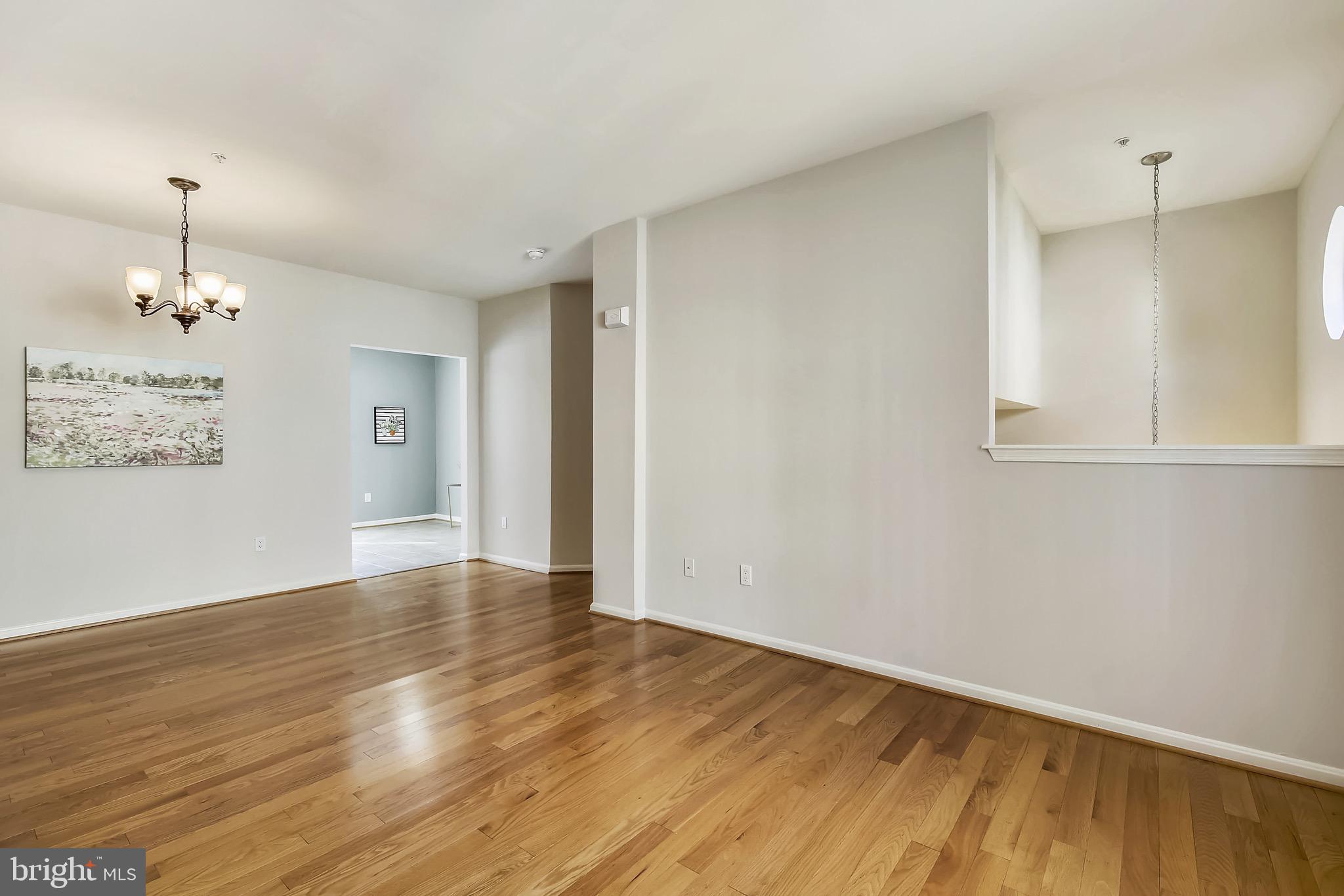 12157 Amber Ridge Circle Germantown, MD 20876 - Photo 18 of 36 Spacious Family Room and Dining Room area