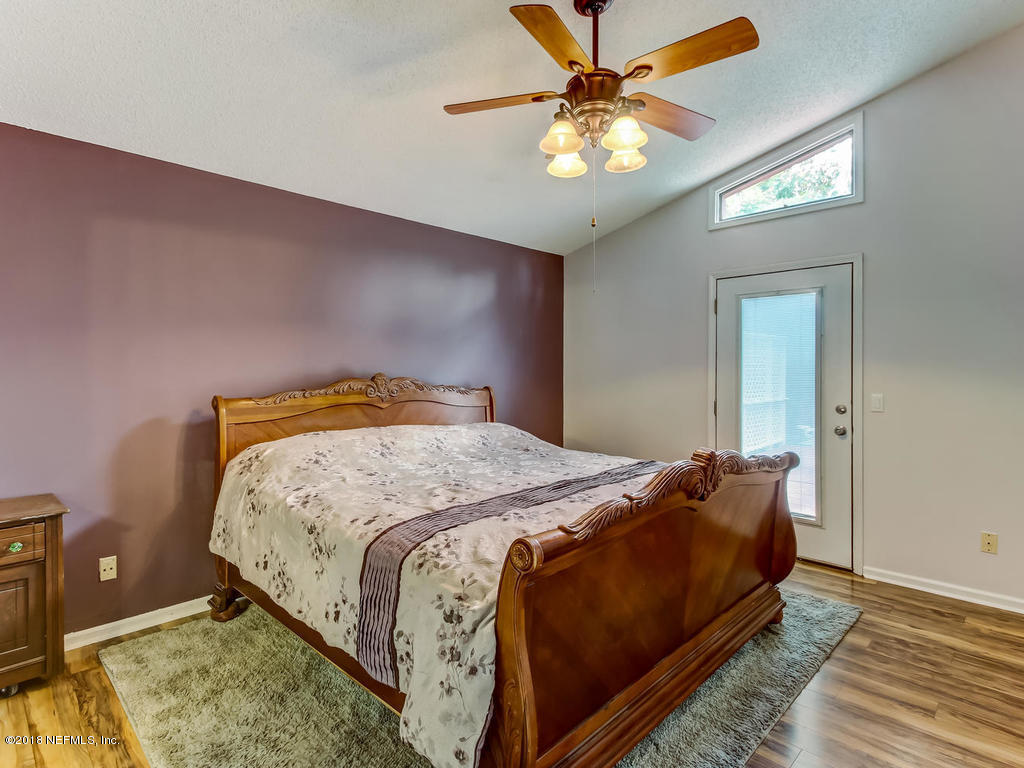 5335 Raccoon Ridge Court Jacksonville, FL 32258 - Photo 14 of 32 5335 Raccoon Ridge Ct-018-35-Master Bedr