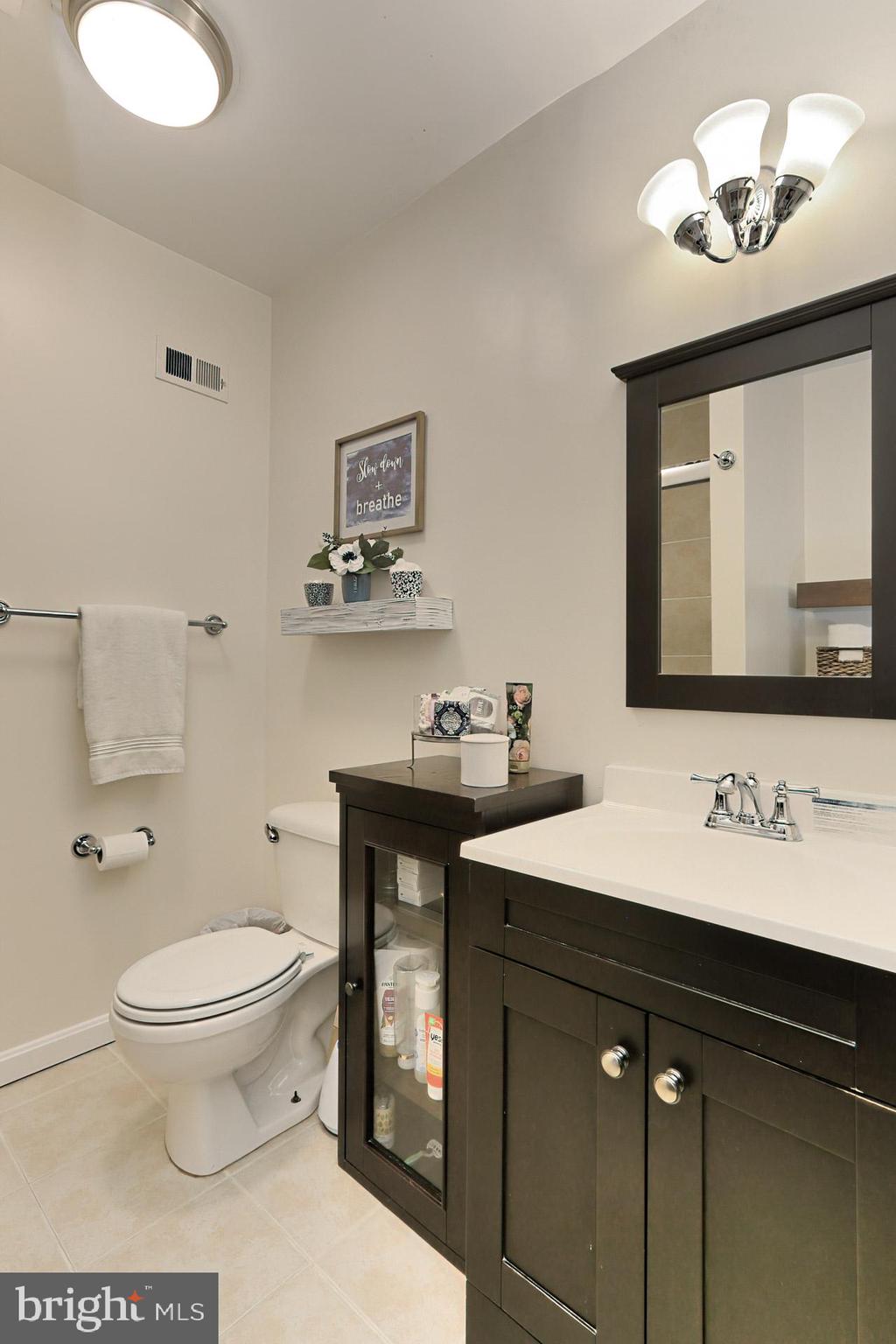 2404 Wanda Way Reston, VA 20191 - Photo 19 of 34 Refreshed Bathroom- Tile Flooring, Lights