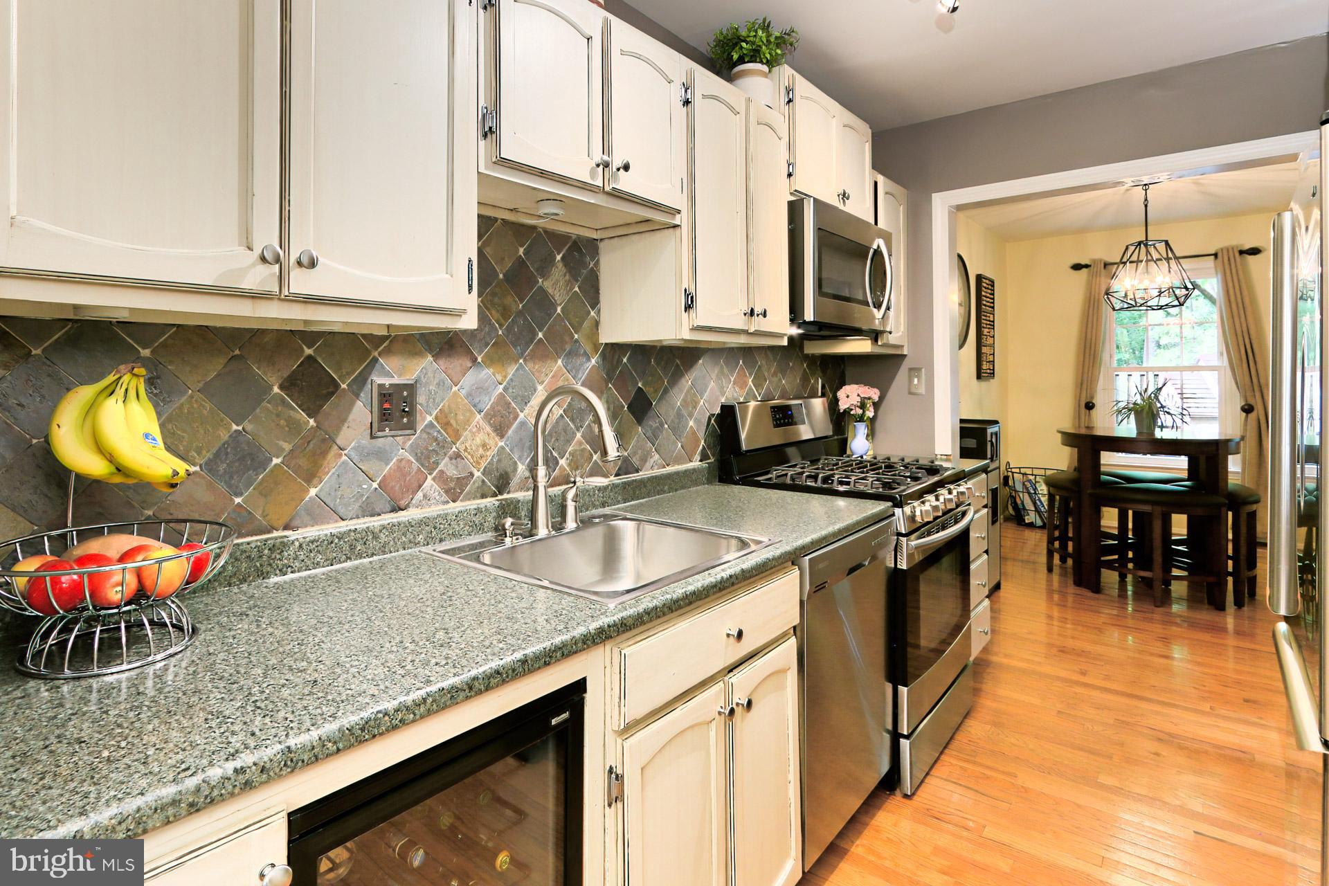 2404 Wanda Way Reston, VA 20191 - Photo 5 of 34 Refreshed Kitchen Hardwood Flooring