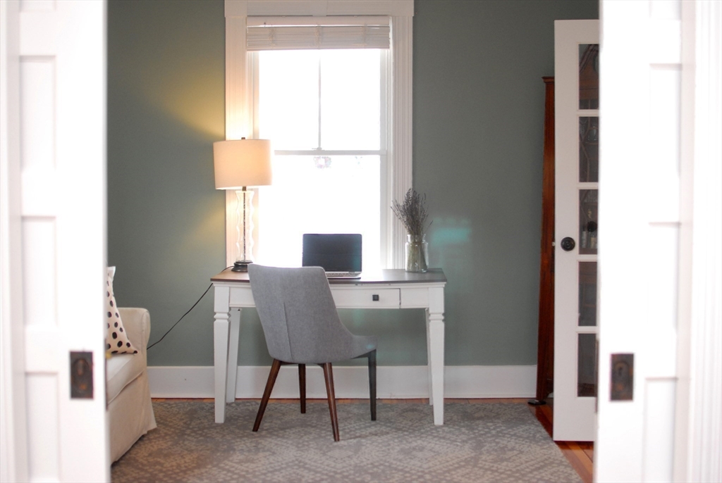 32 Highland Street Concord, MA 01742 - Photo 20 of 28 a view of a workspace with furniture and a window