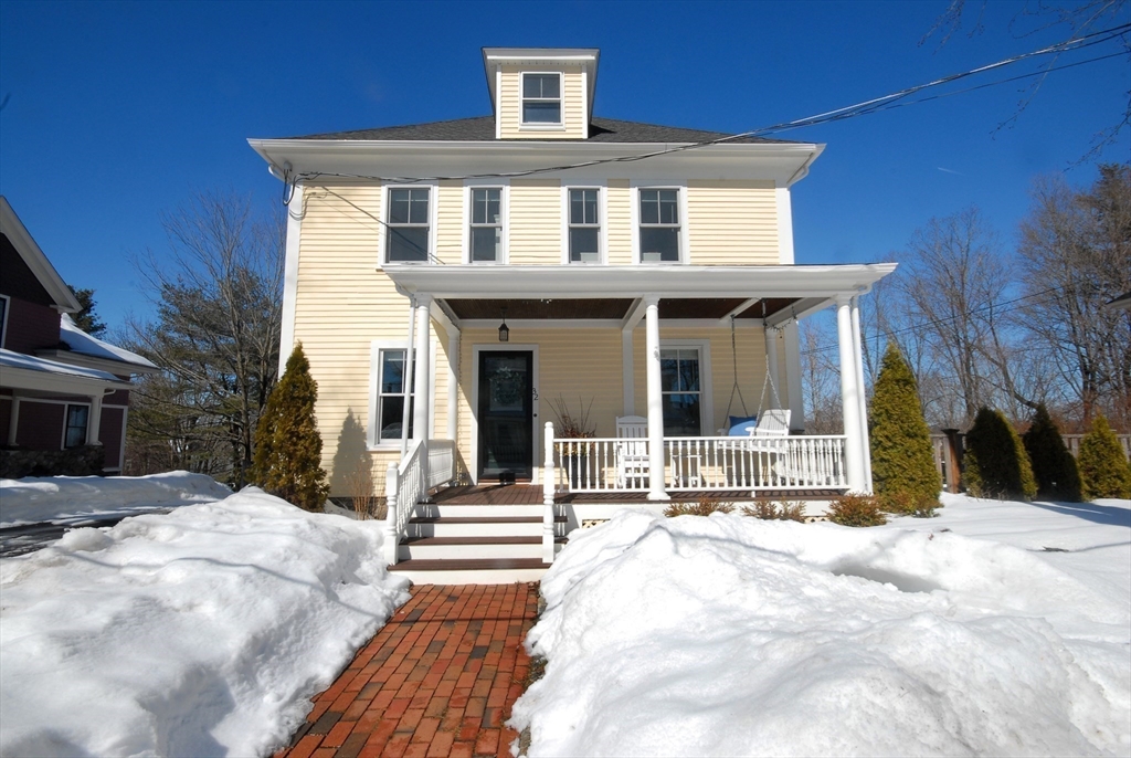 32 Highland Street Concord, MA 01742 - Photo 25 of 28 a front view of a house with a yard