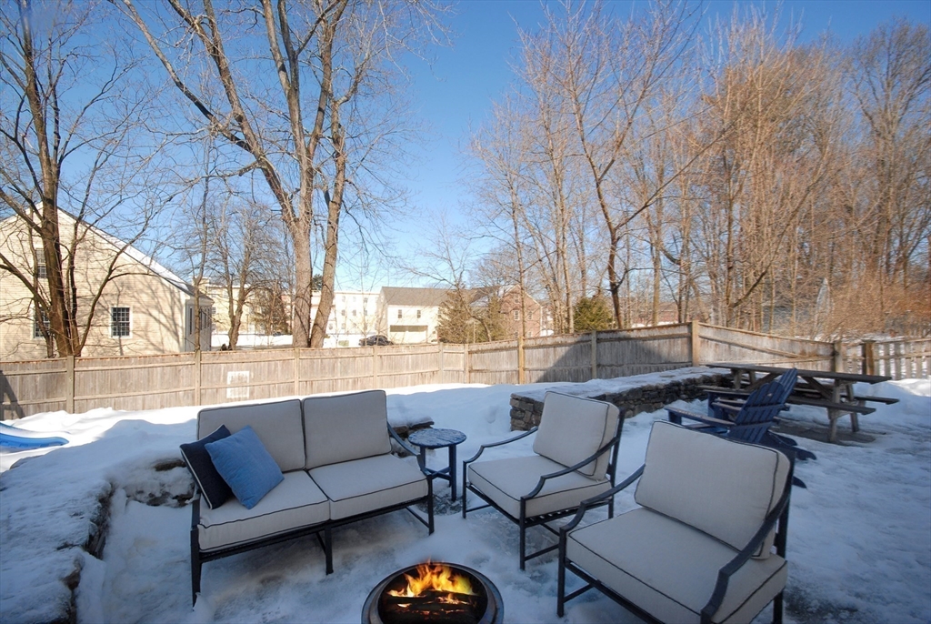 32 Highland Street Concord, MA 01742 - Photo 26 of 28 a view of a patio with couches and a fire pit