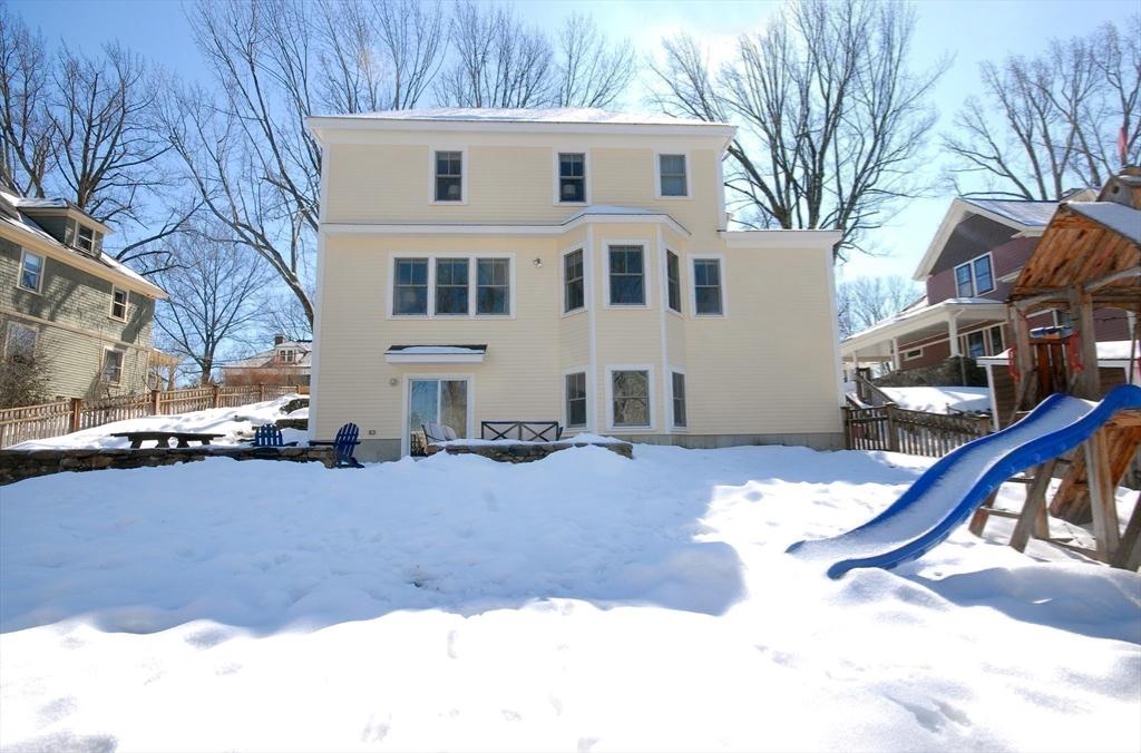 32 Highland Street Concord, MA 01742 - Photo 27 of 28 a view of a house with snow on the road