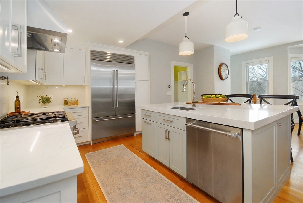 32 Highland Street Concord, MA 01742 - Photo 5 of 28 a kitchen with a sink stainless steel appliances and window