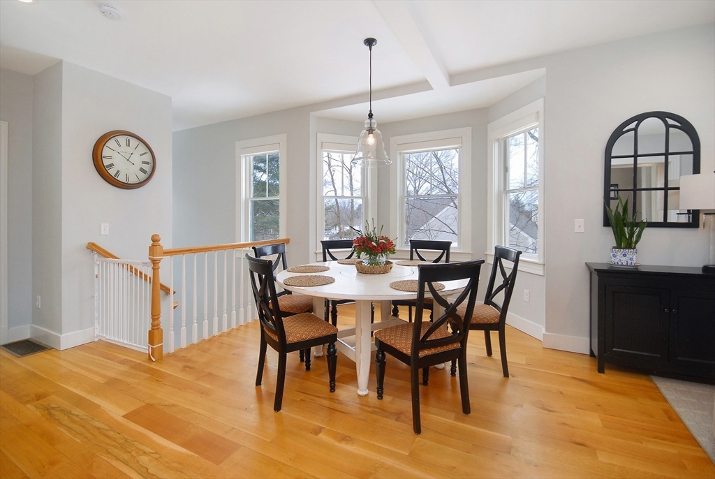 32 Highland Street Concord, MA 01742 - Photo 6 of 28 a view of a dining room with furniture window and wooden floor