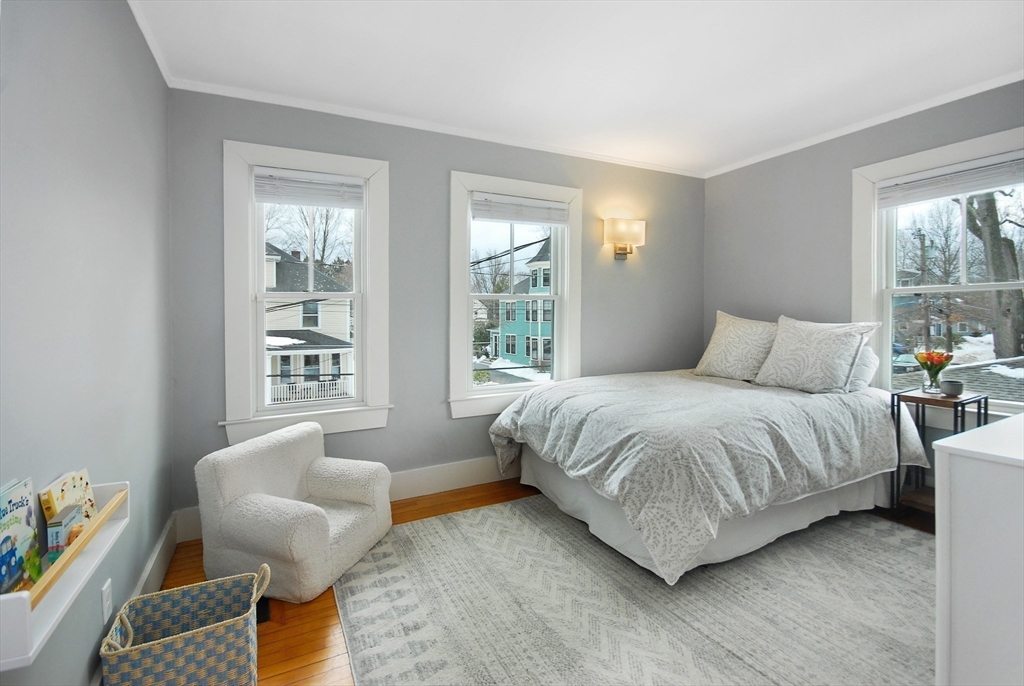 32 Highland Street Concord, MA 01742 - Photo 9 of 28 a bedroom with a bed and a couch