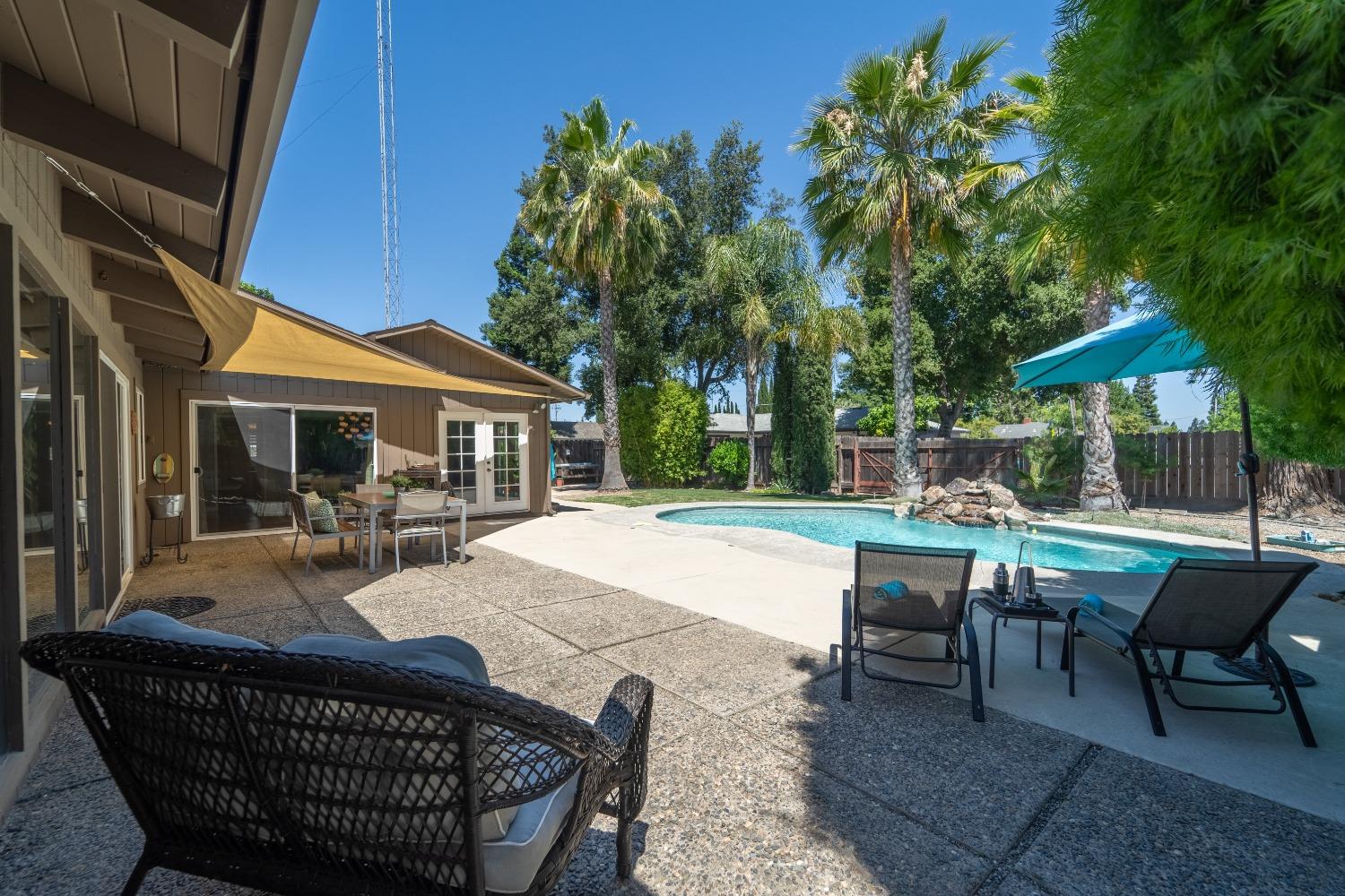 447 California Street Ripon, CA 95366 - Photo 1 of 1 a view of a house with backyard and sitting area