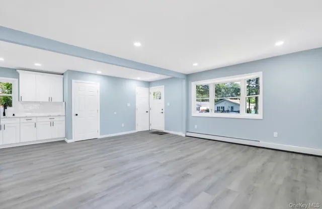 $570,000 | 111 A Wood Avenue, Mastic, NY 11950