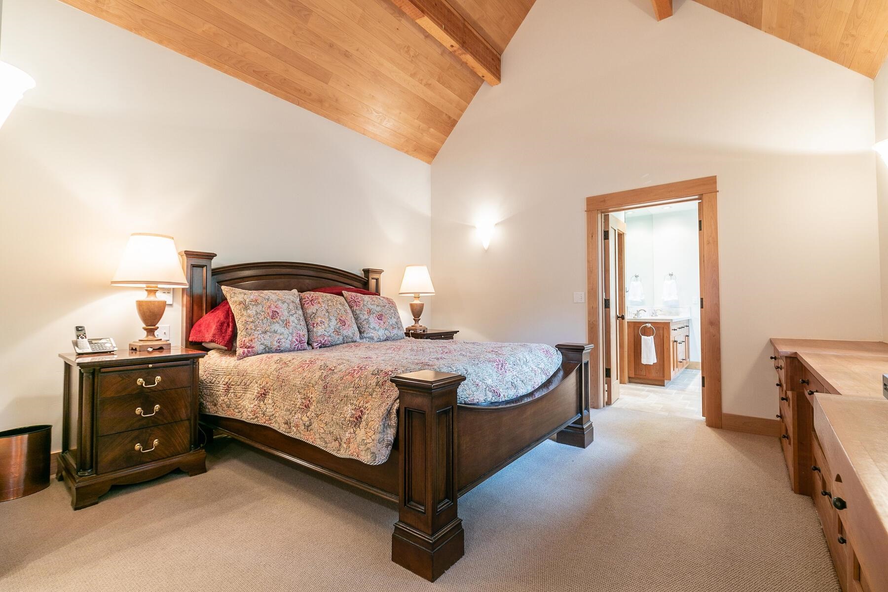 8433 Jake Teeter Drive Truckee, CA 96161 - Photo 13 of 21 a bedroom with a bed and a cabinets