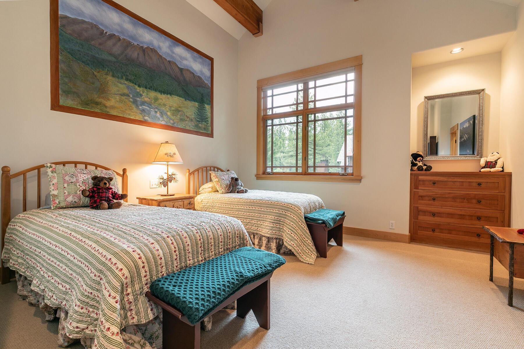 8433 Jake Teeter Drive Truckee, CA 96161 - Photo 16 of 21 a bedroom with a bed and dresser
