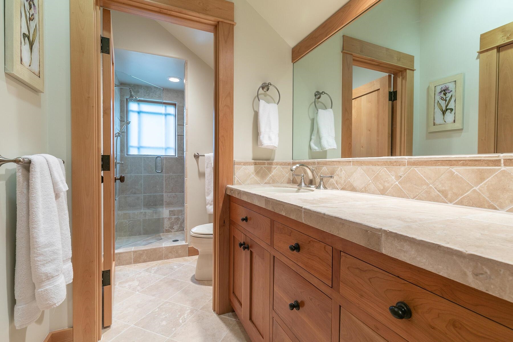 8433 Jake Teeter Drive Truckee, CA 96161 - Photo 17 of 21 a bathroom with a granite countertop sink mirror and double