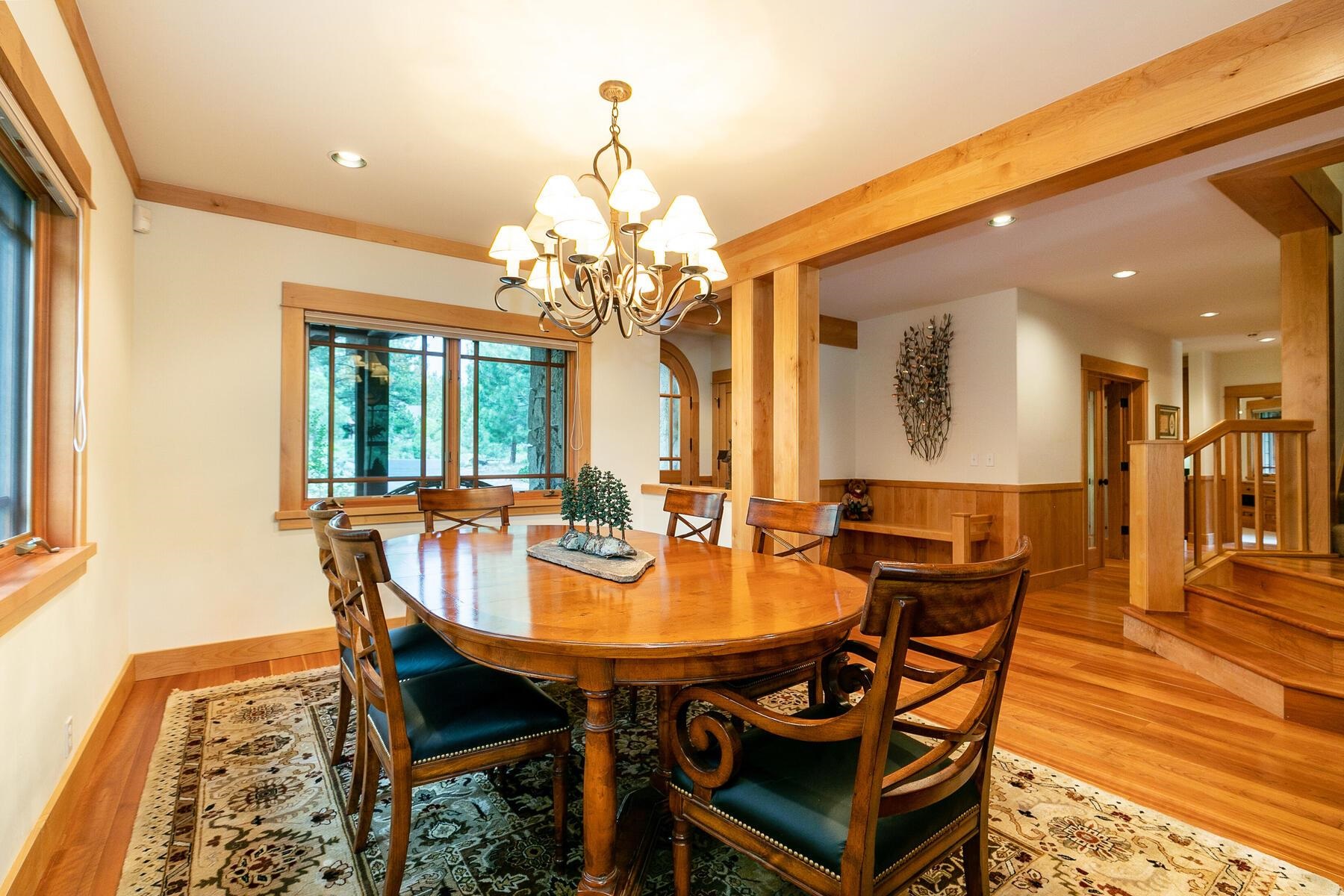 8433 Jake Teeter Drive Truckee, CA 96161 - Photo 10 of 21 a view of a dining room with furniture and wooden floor