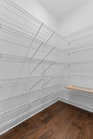 a view of a room with racks on the wall