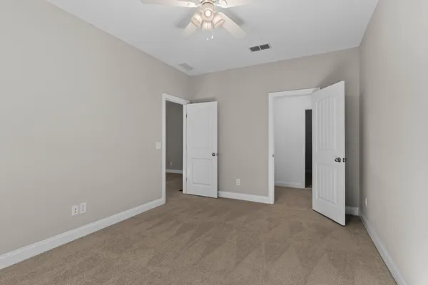 an empty room with a bathroom