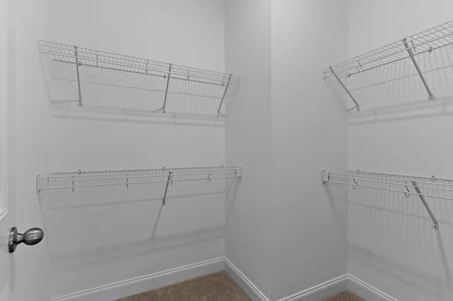 a view of a room with racks on the wall