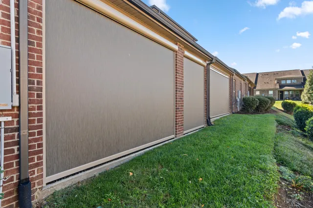 a backyard of a house with lots of green space