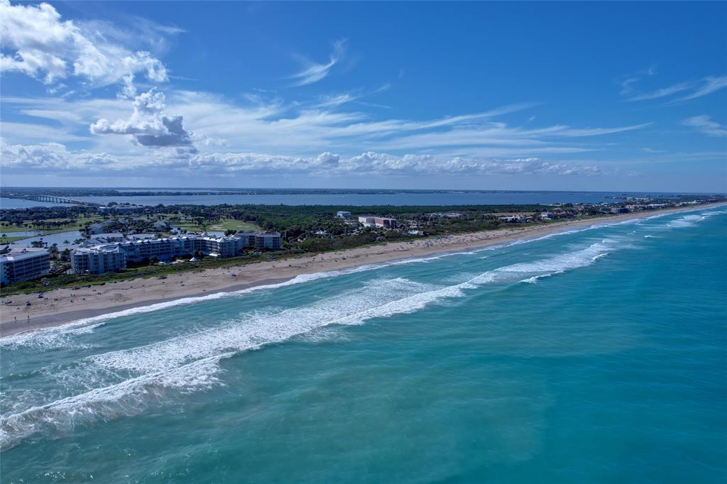 40 Northeast Plantation Road, Unit 208 Stuart, FL 34996 - Photo 11 of 38 a view of a yard with an ocean view
