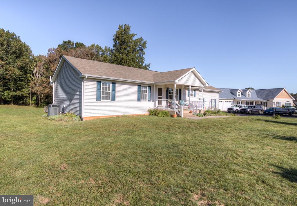 9288 Stonegate Lane Rhoadesville, VA 22542 - Photo 17 of 53 Left side view of home & front yard