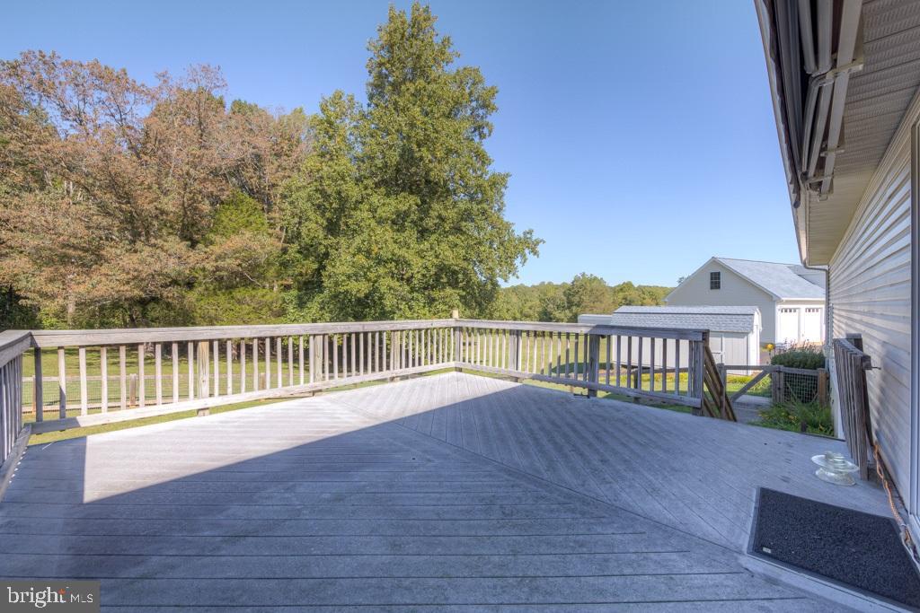 9288 Stonegate Lane Rhoadesville, VA 22542 - Photo 19 of 53 16 X 16 Rear Deck with trex decking