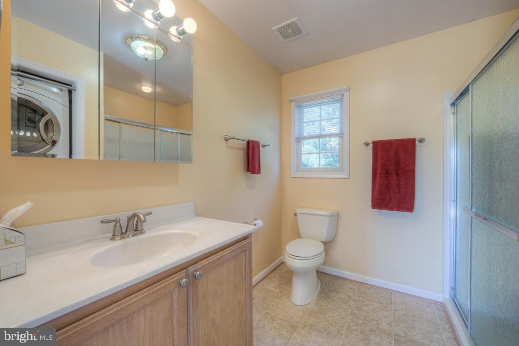 9288 Stonegate Lane Rhoadesville, VA 22542 - Photo 29 of 53 Full bathroom for bedroom #2 & 3 -Vinyl floors