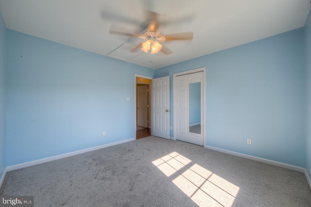9288 Stonegate Lane Rhoadesville, VA 22542 - Photo 32 of 53 New Carpets in Bedrooms, closet mirror stays.