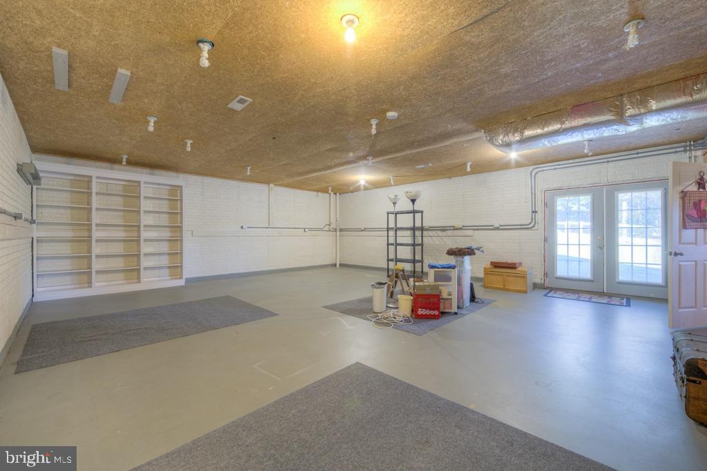 9288 Stonegate Lane Rhoadesville, VA 22542 - Photo 33 of 53 Huge open room in basement wonderful hobby room-