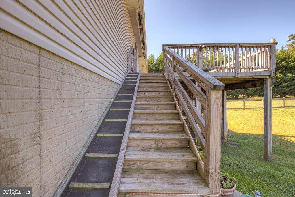 9288 Stonegate Lane Rhoadesville, VA 22542 - Photo 35 of 53 Deck stairs, left side was for small dog.