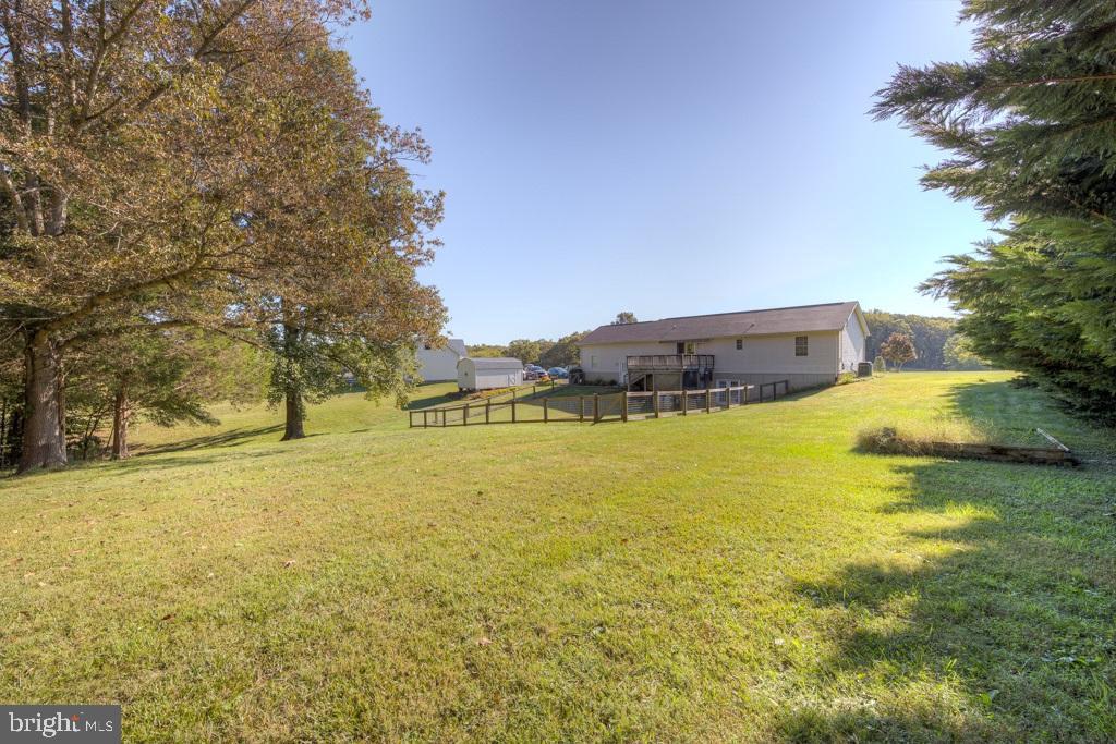 9288 Stonegate Lane Rhoadesville, VA 22542 - Photo 38 of 53 Open backyard to trees, land goes way back in tree