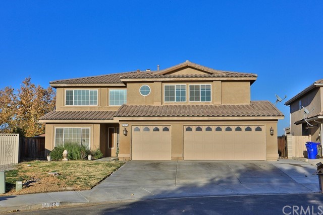 14162 Gopher Canyon Road Victorville, CA 92394 - Photo 1 of 1 a front view of a house with a yard