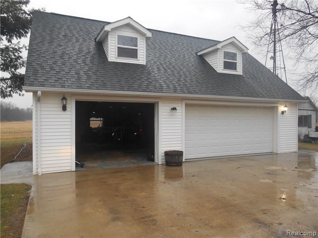 3701 Oak Grove Road North Branch, MI 48461 - Photo 39 of 45 Three car detached garage with cement pad approach.
