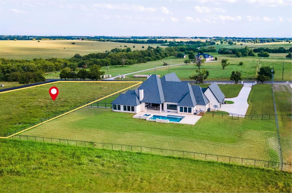 6865 Cr 177 Road Celina, TX 75009 - Photo 2 of 12 an aerial view of a house with a yard