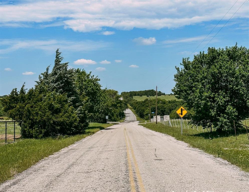 6865 Cr 177 Road Celina, TX 75009 - Photo 6 of 12 a view of a road with a yard
