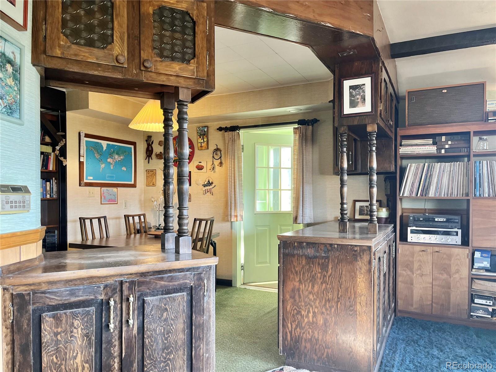160 South Circle Drive Bailey, CO 80421 - Photo 12 of 26 a bathroom with a sink a mirror and vanity