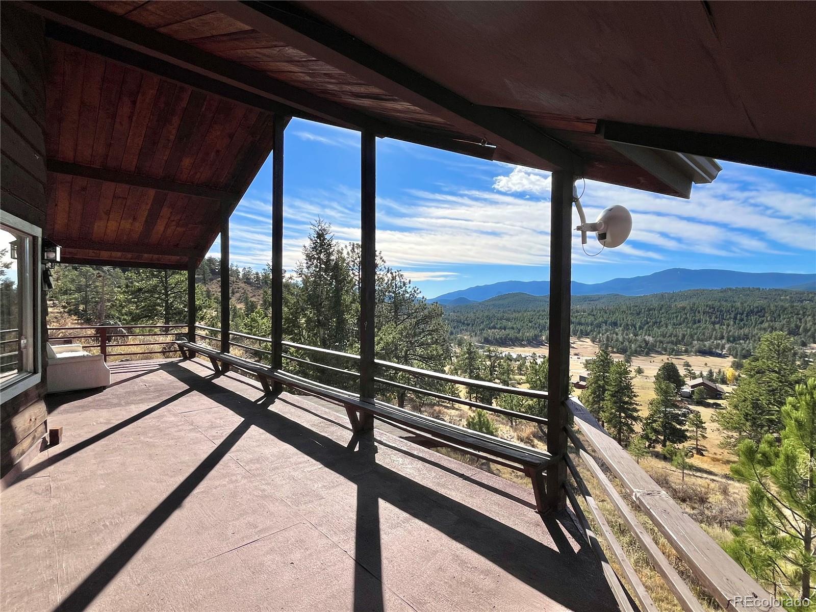 160 South Circle Drive Bailey, CO 80421 - Photo 20 of 26 a view of railway station with a porch