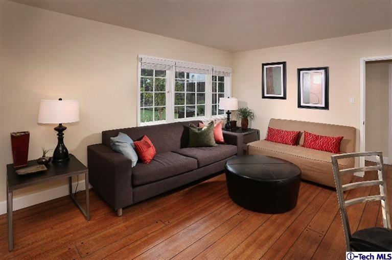 1915 Cañada Boulevard Glendale, CA 91208 - Photo 13 of 42 a living room with furniture and a window