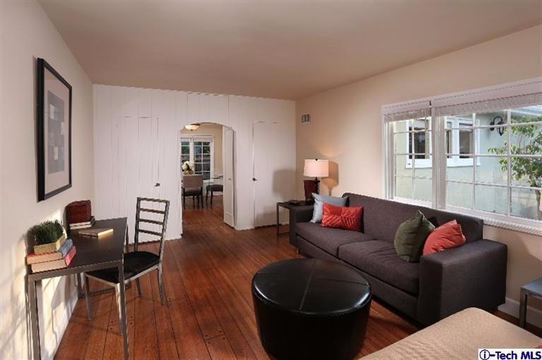 1915 Cañada Boulevard Glendale, CA 91208 - Photo 14 of 42 a living room with furniture and wooden floor
