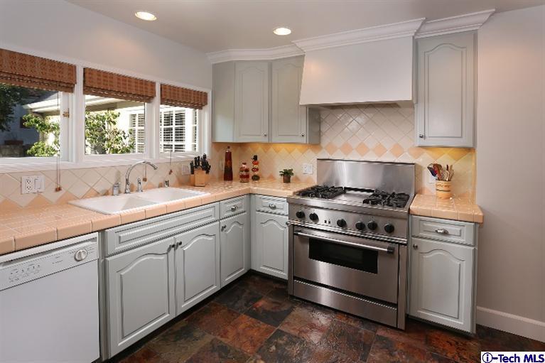 1915 Cañada Boulevard Glendale, CA 91208 - Photo 17 of 42 a kitchen with a stove and a sink