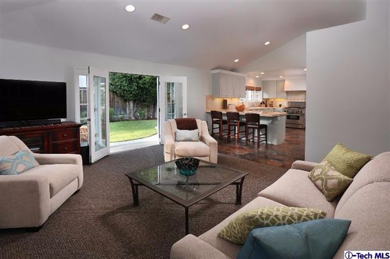 1915 Cañada Boulevard Glendale, CA 91208 - Photo 21 of 42 a living room with furniture and a flat screen tv