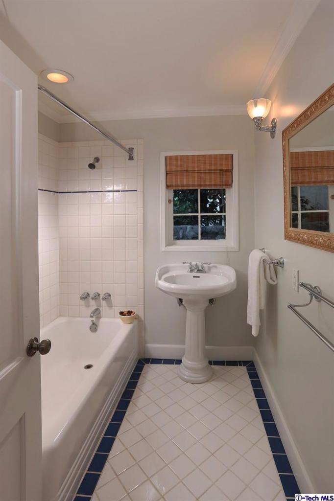 1915 Cañada Boulevard Glendale, CA 91208 - Photo 28 of 42 a bathroom with a sink toilet and shower