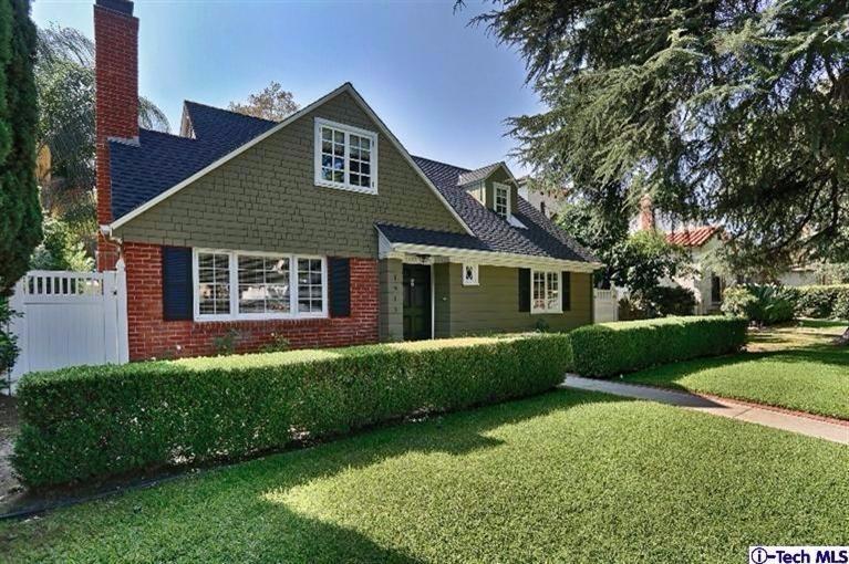 1915 Cañada Boulevard Glendale, CA 91208 - Photo 4 of 42 a front view of a house with a garden